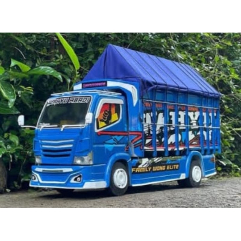 Cod miniatur truk oleng lampu terpal