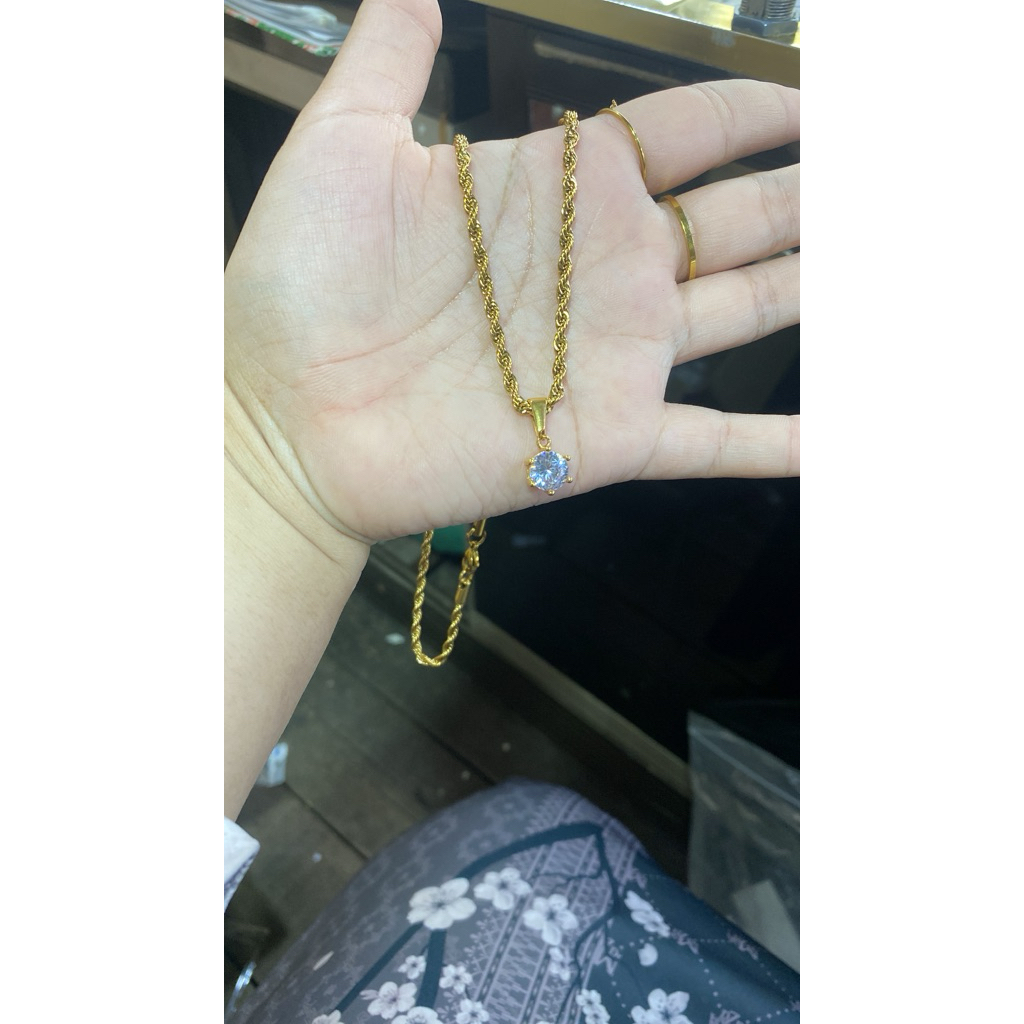 kalung titanium