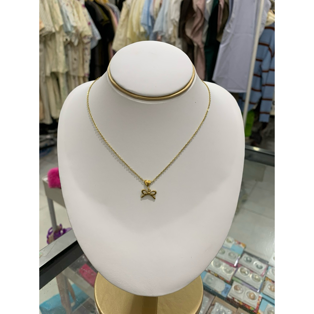 kalung pita titanium