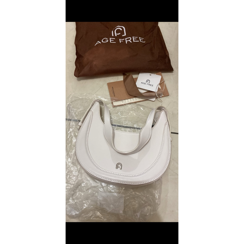 co tas putih