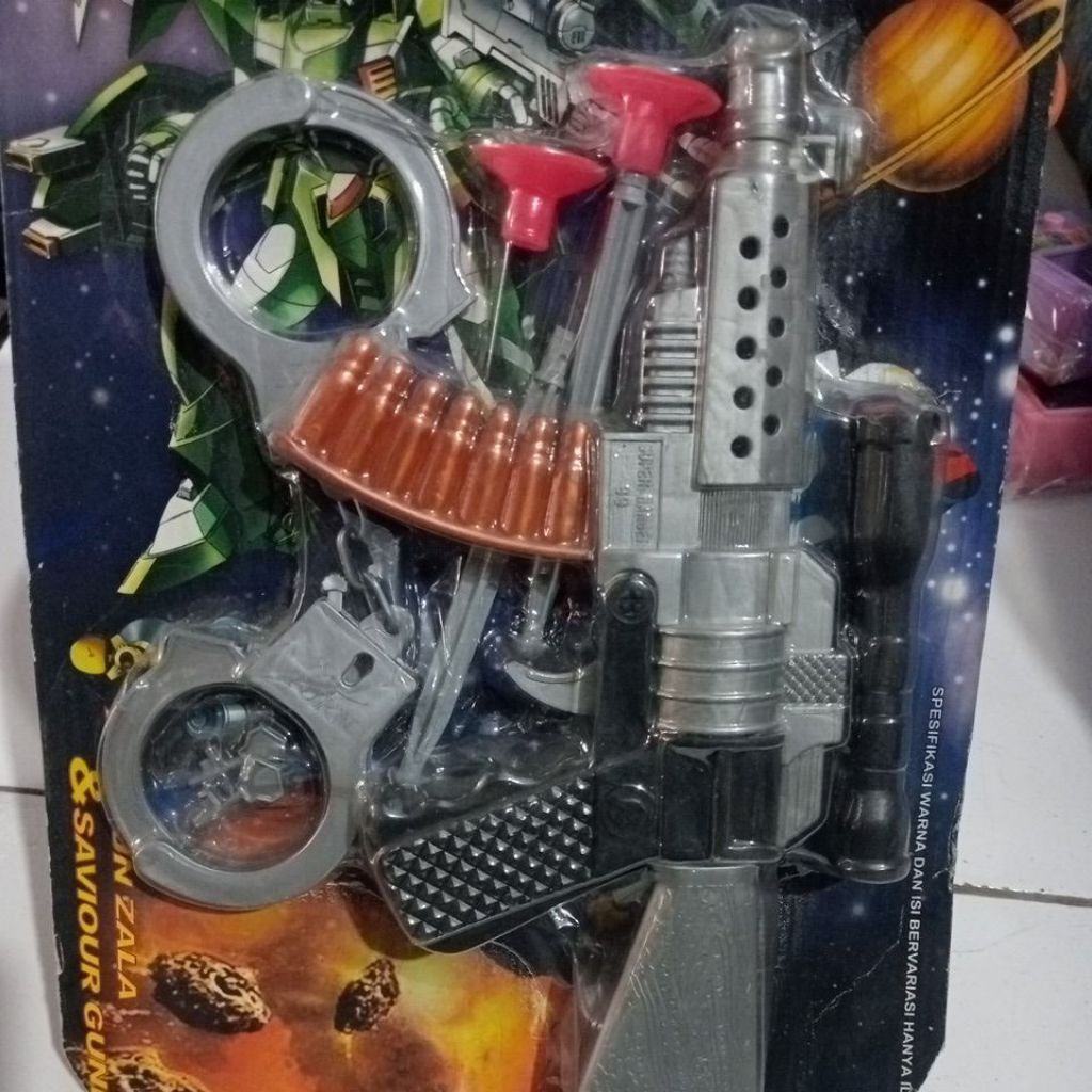 pistol mainan dan borgol mainan ,