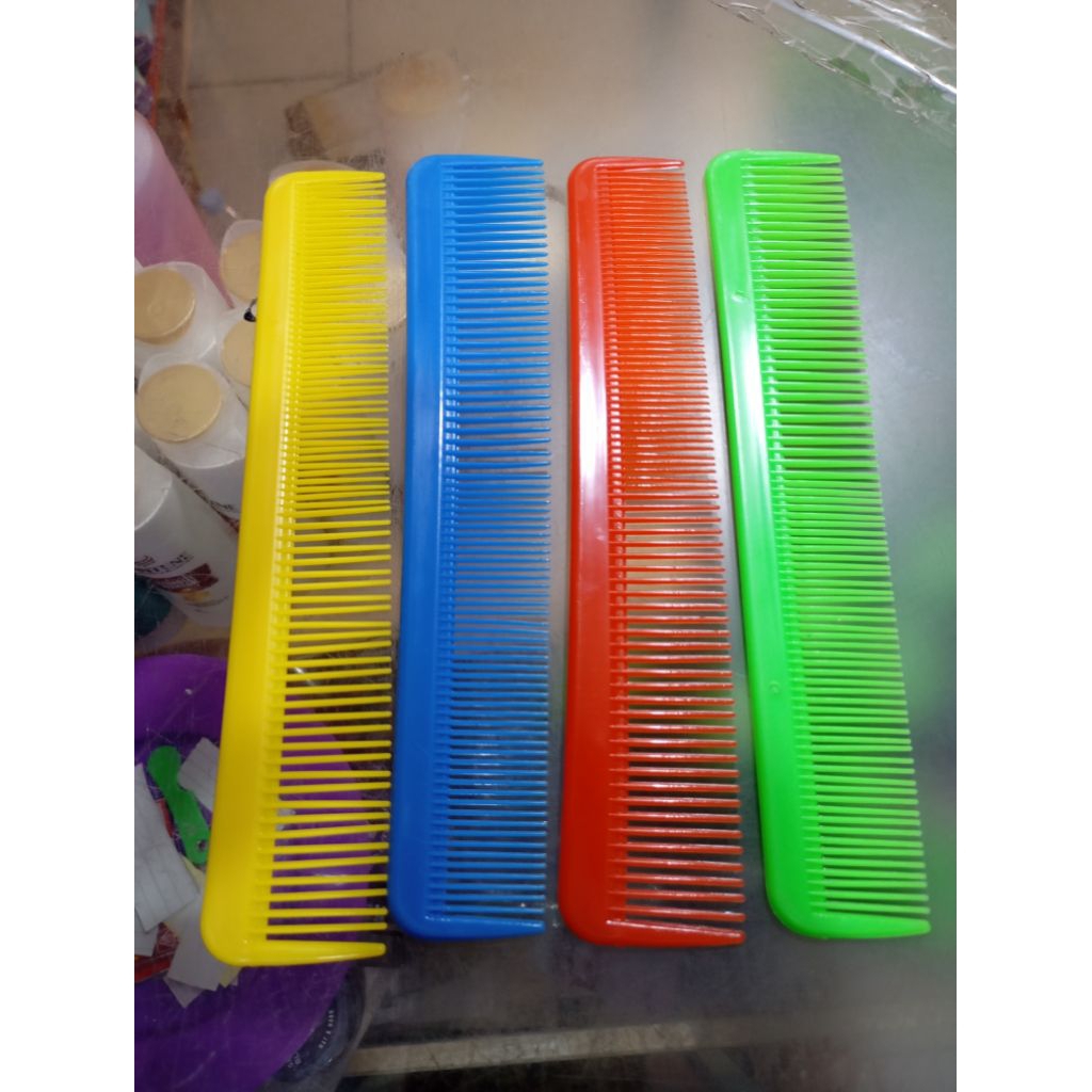 Sisir rambut warna warni lurus