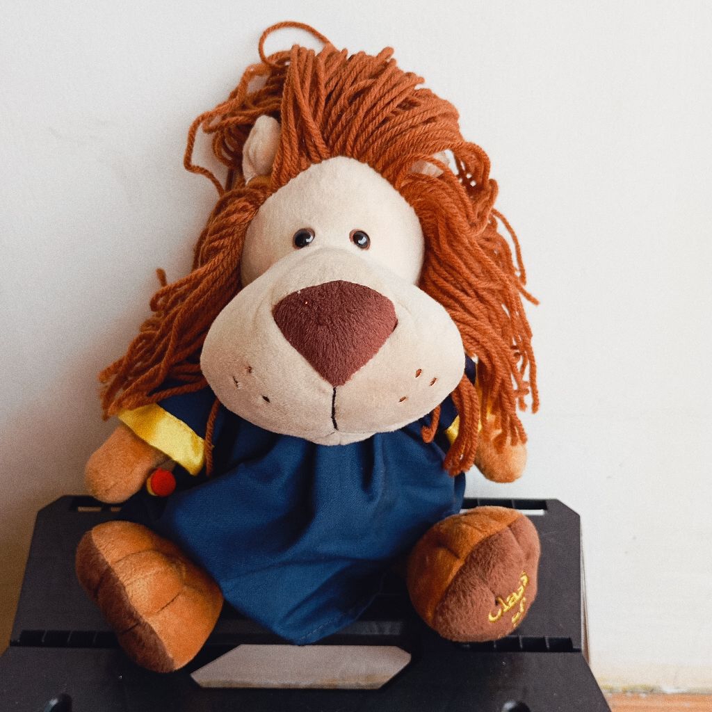 Boneka Singa wisuda graduate