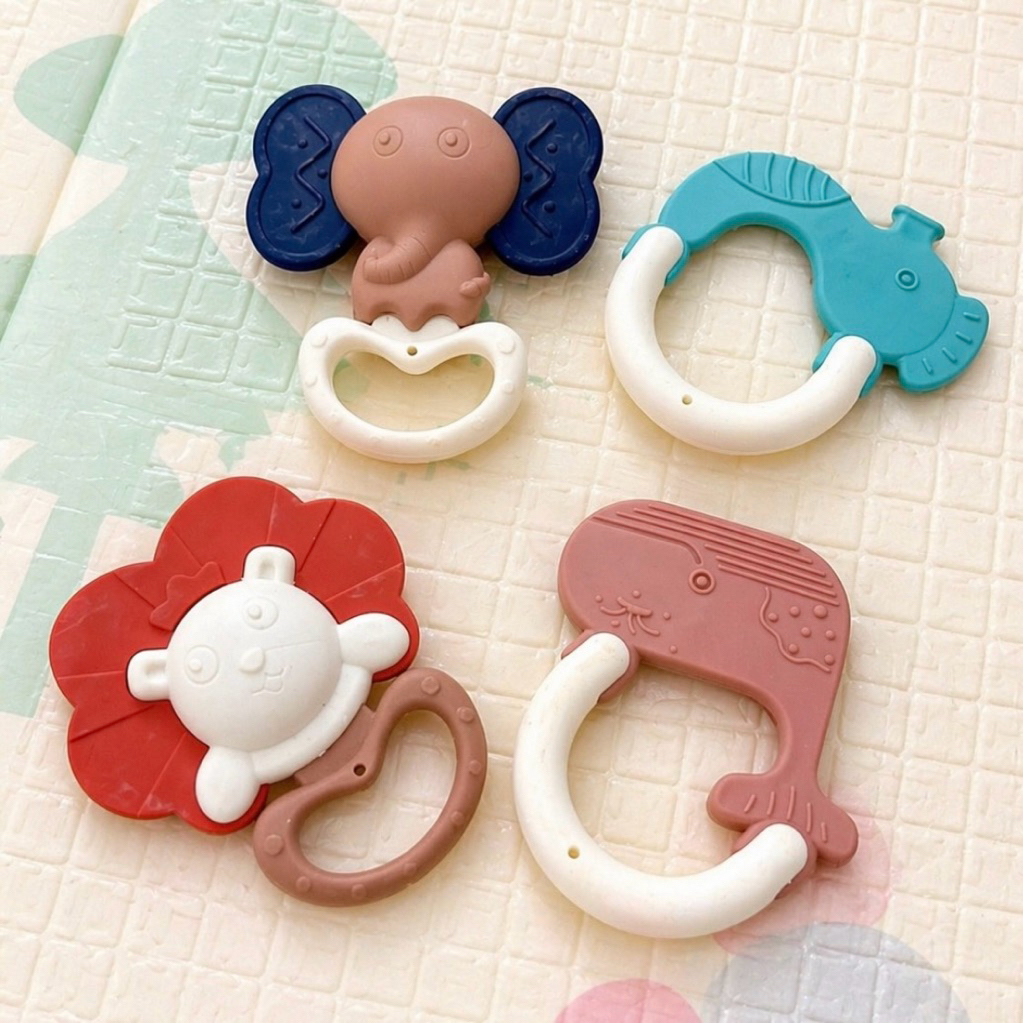 Mainan boneka genggam bayi