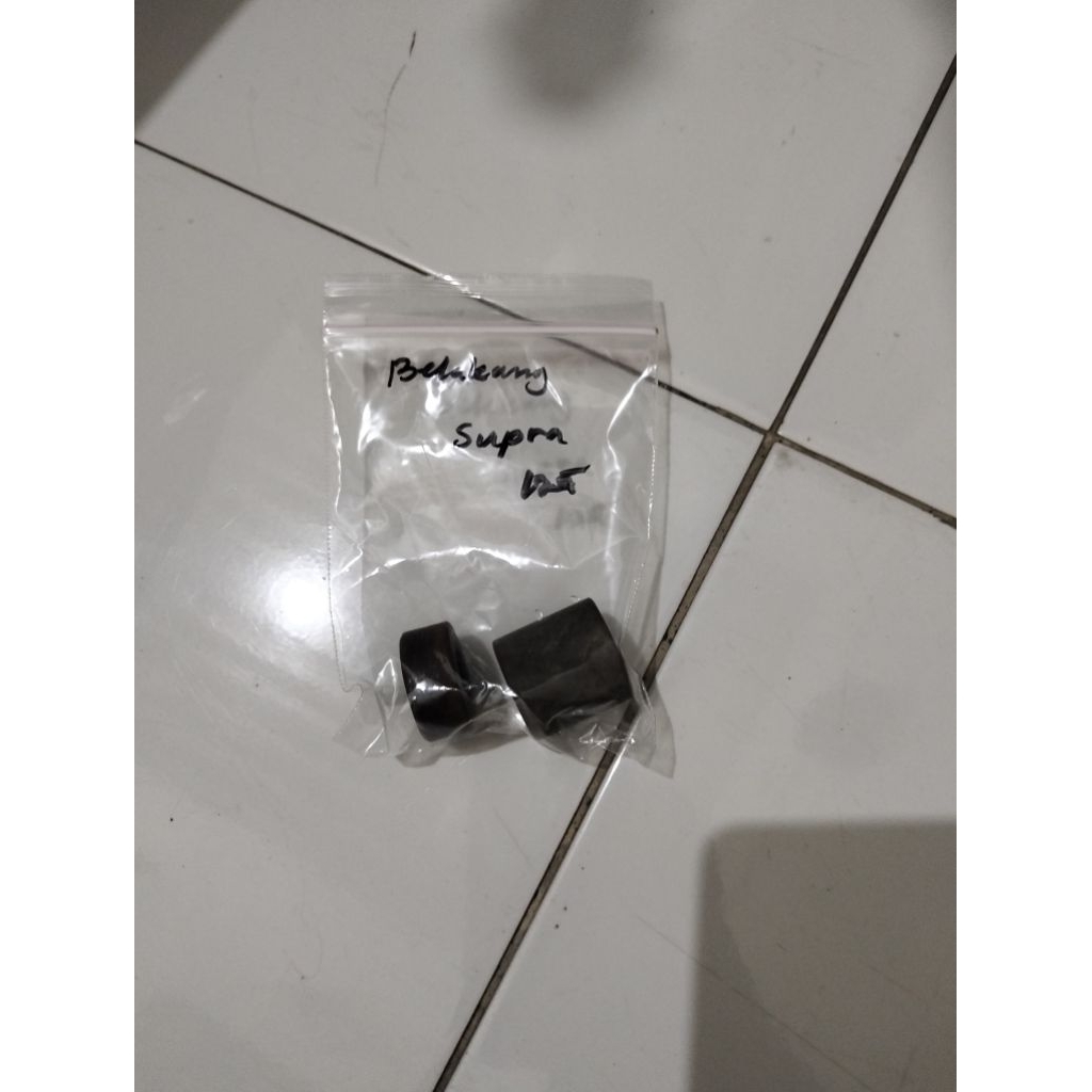 busing belakang Supra 125