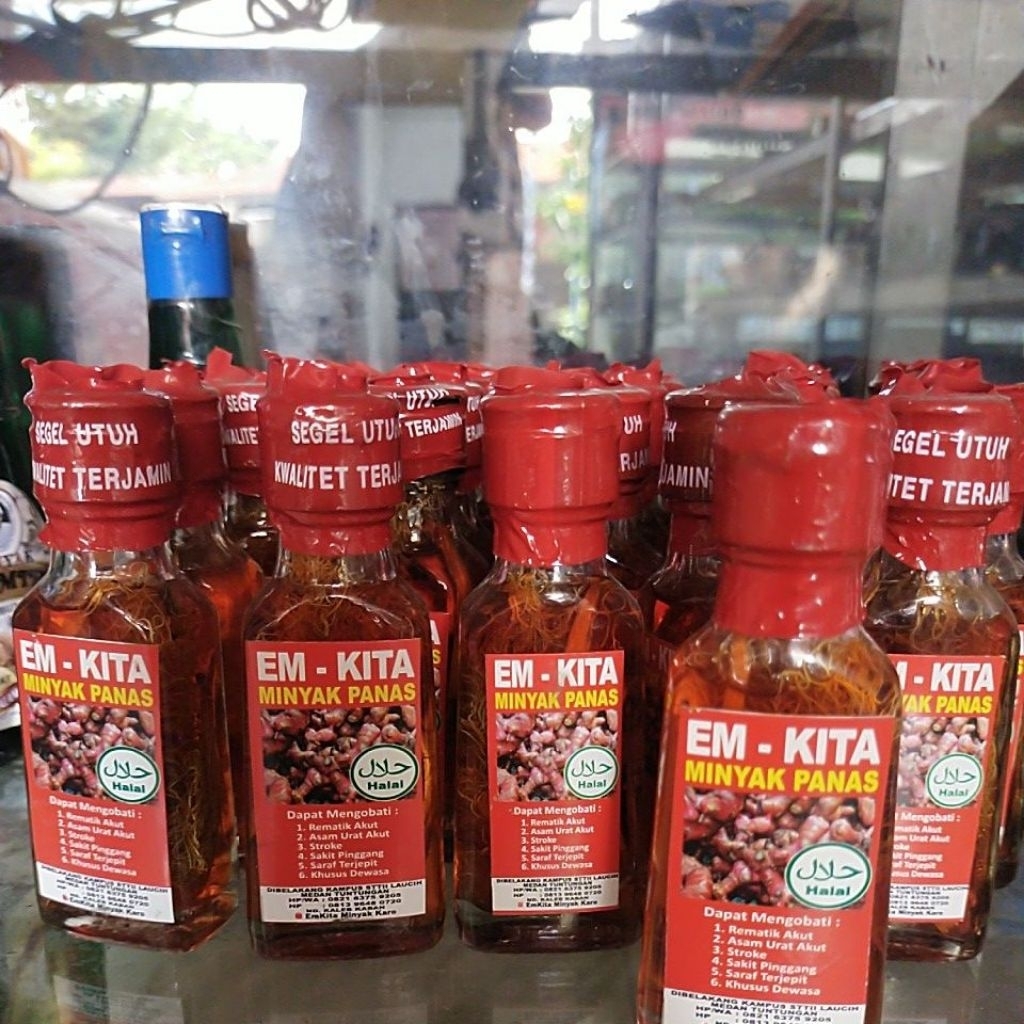 Minyak Karo panas ada akarnya 30 ml