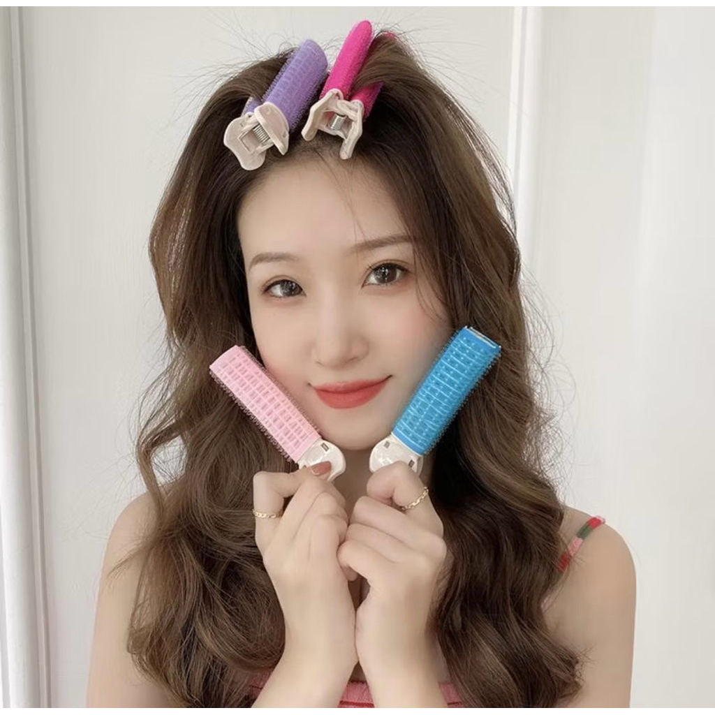 Roll rambut poni