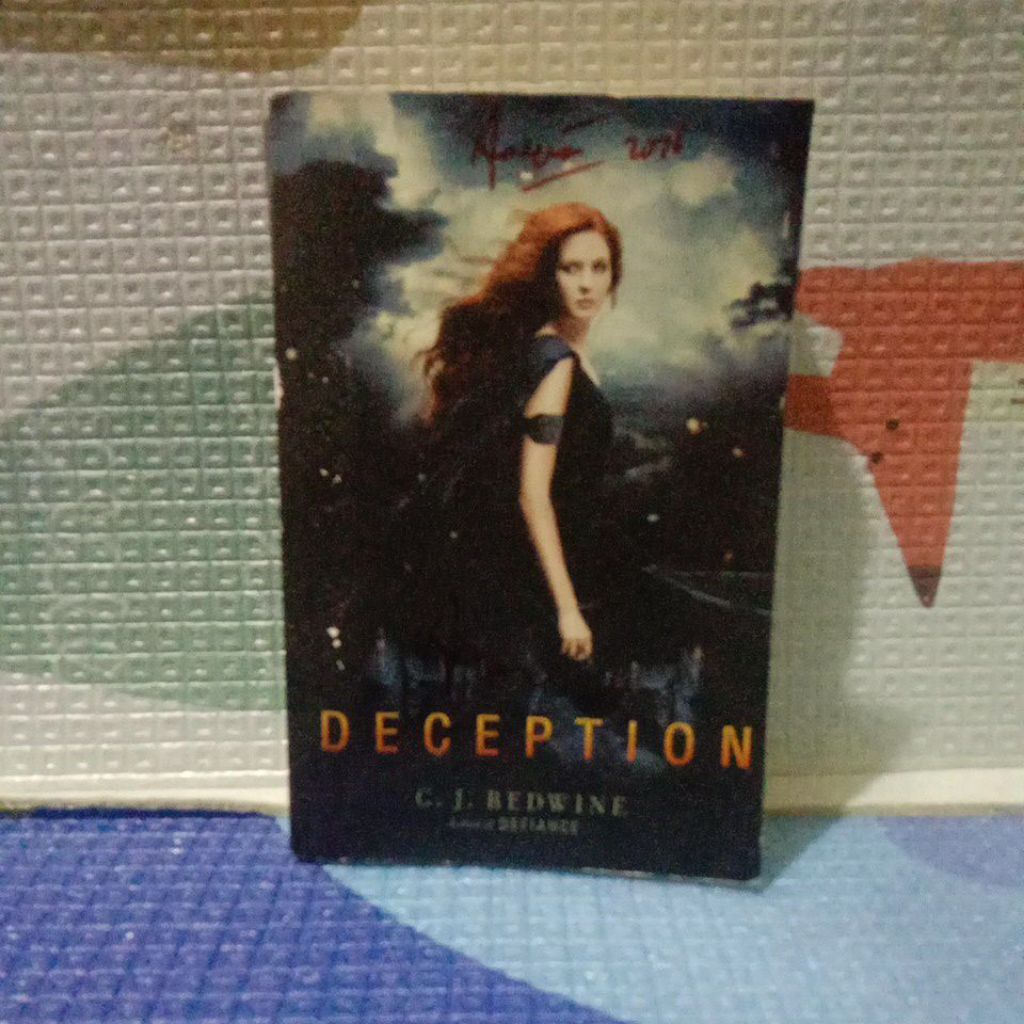 NOVEL DECEPTION -C. J. REDWINE