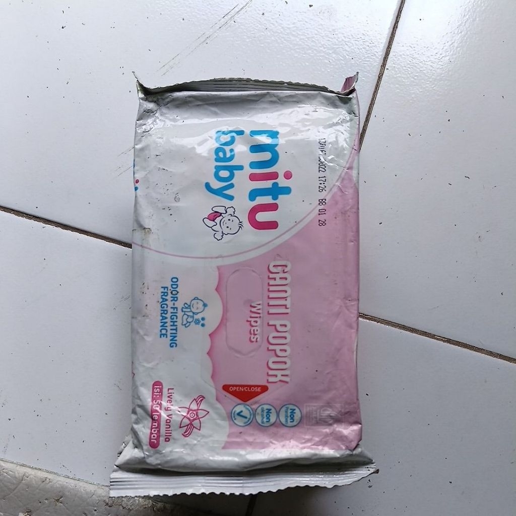 Tisu basah mitu (resi)