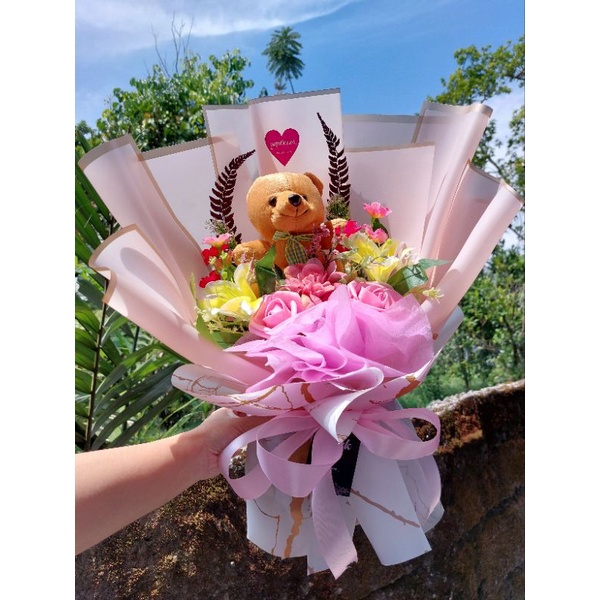 promo boneka gembul wisuda