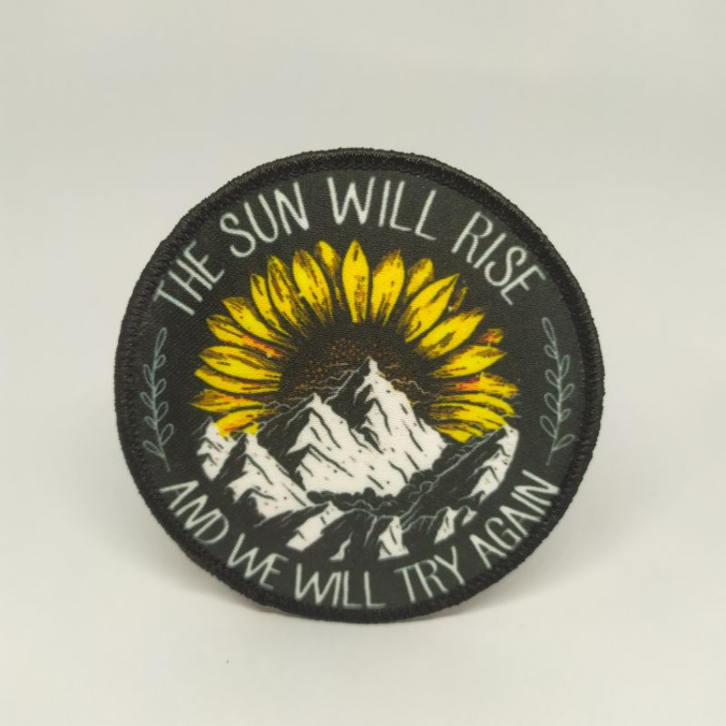 Emblem The Sun Will Rise
