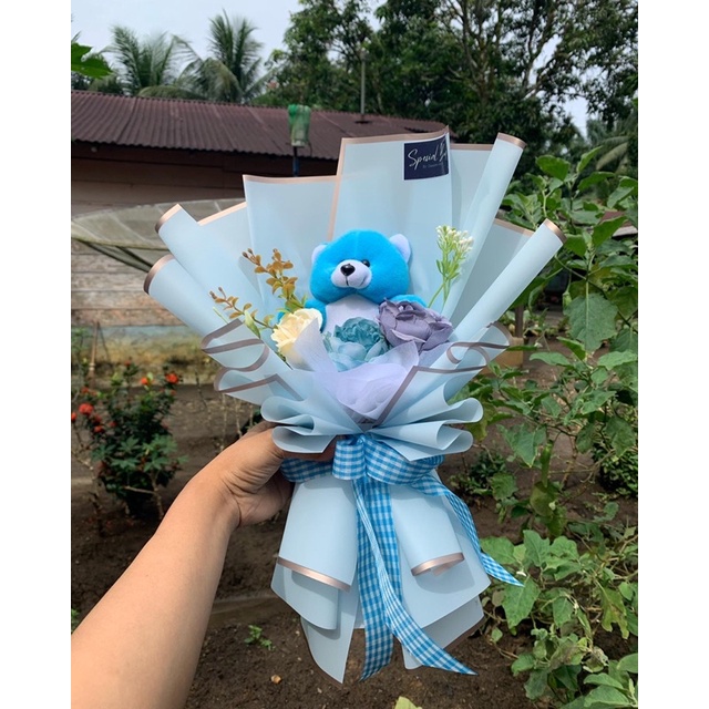 Boneka + artificial flower buke with blue wrapping paper
