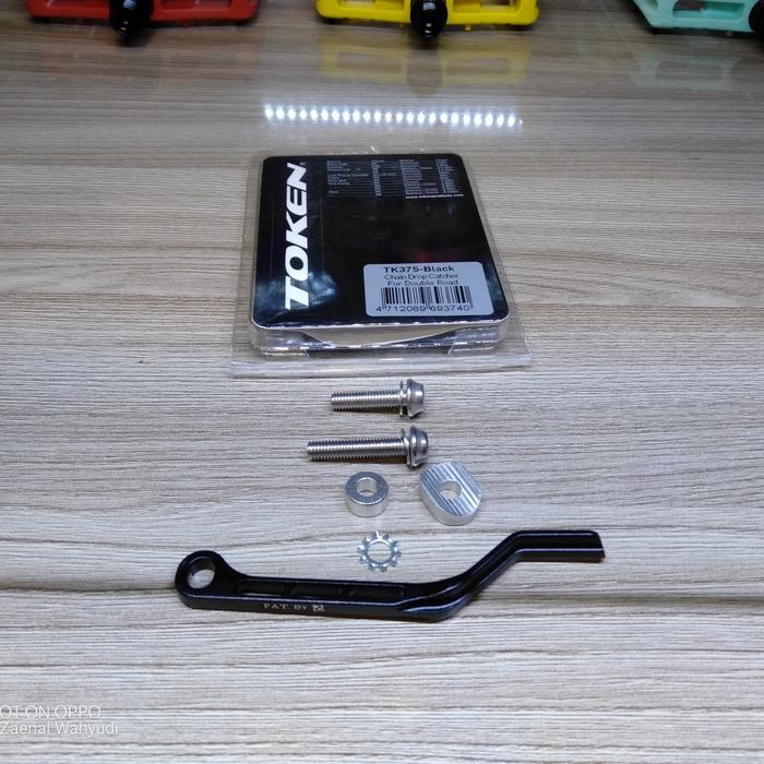 TOKEN CHAIN DROP CATCHER FOR DOUBLE ROAD