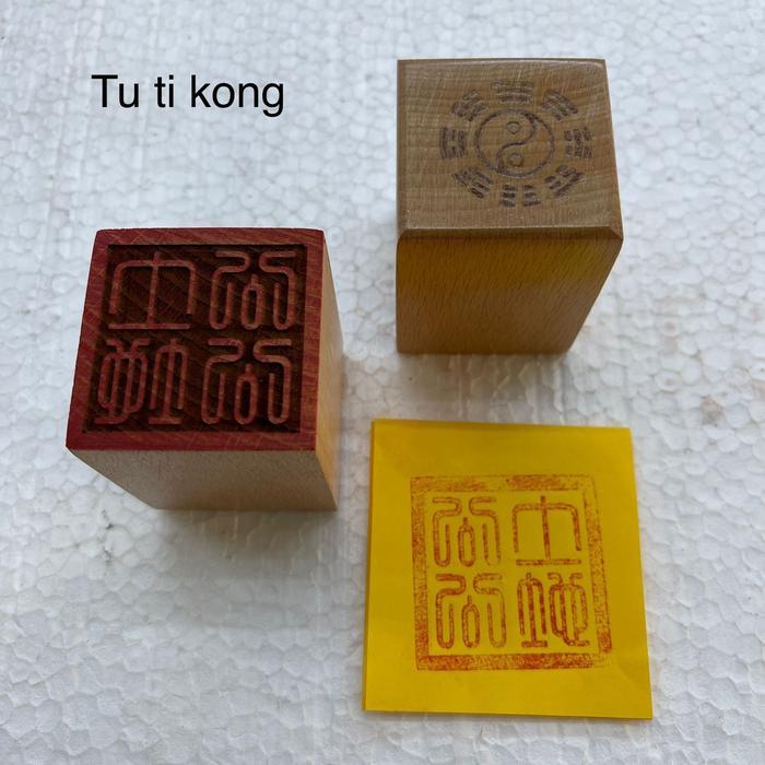 stempel cap dewa Tutikong