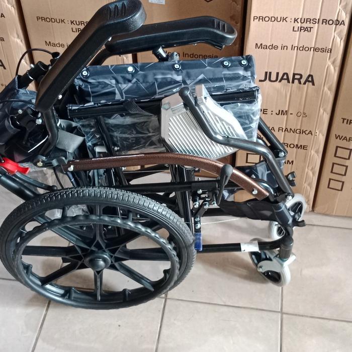 kursi roda black elegant
